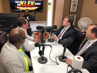 Image of KLEK officials and FNB officials making the on-air announcement of the donation. 